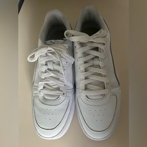 PUMA white tennis shoe Size 10. SOFT Foam not warn a few times.
